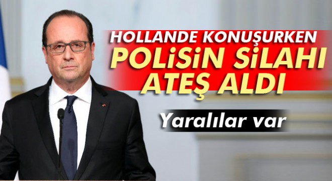 Fransa Cumhurbaşkanı Hollande konuşurken keskin nişancının silahı ateş aldı