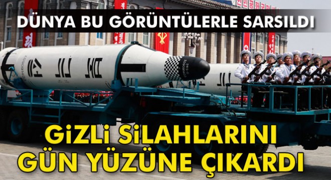 Kuzey Kore, dev törende uzun menzilli füzelerini sergiledi
